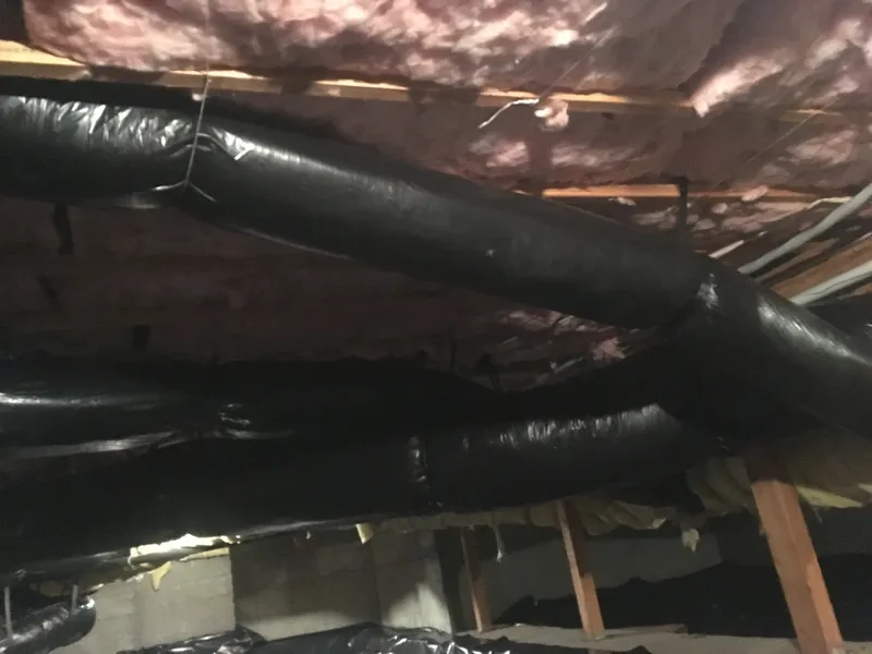 New insulated ducts running under the crawl space