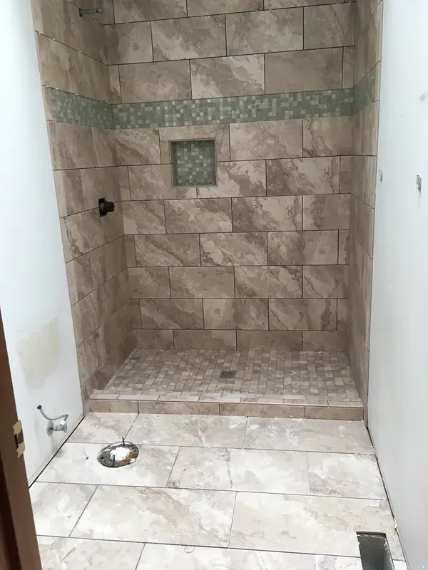 New tile work in a walk in shower