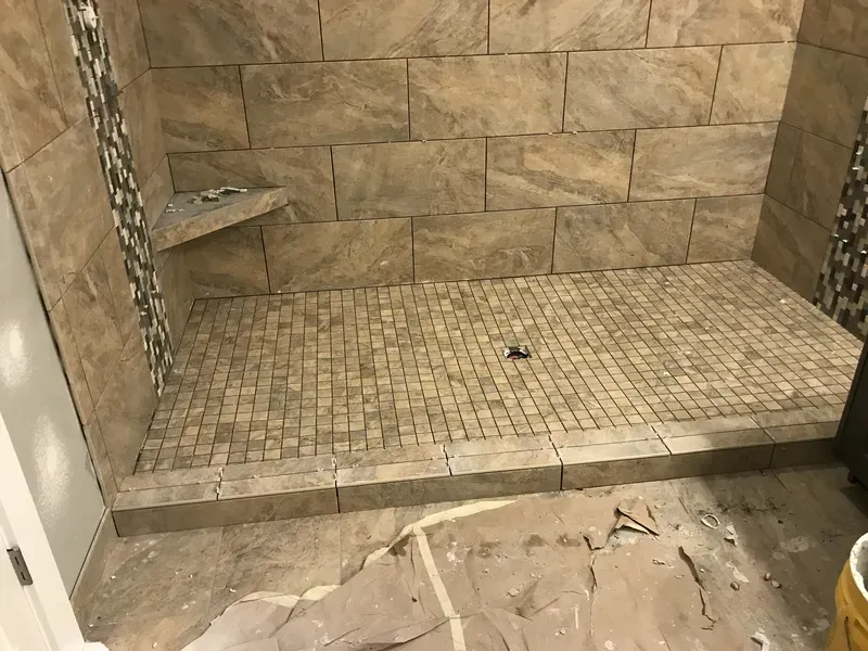 Closeup of the tile on the floor of a walk in shower