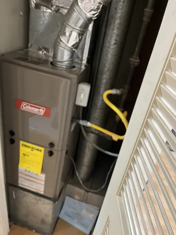 Closet Coleman furnace install with flexible tubing